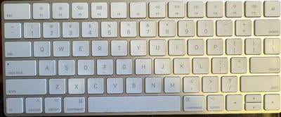 Restored Apple Magic Keyboard MLA22LL/A (Silver) (Refurbished