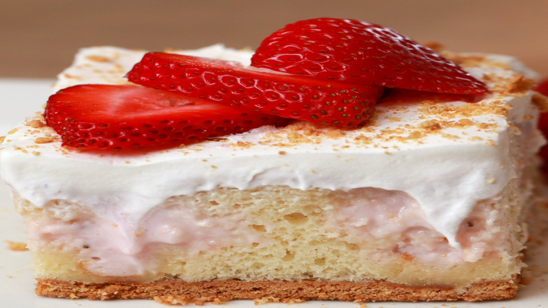 Strawberry cheesecake poke cake Recipe photo