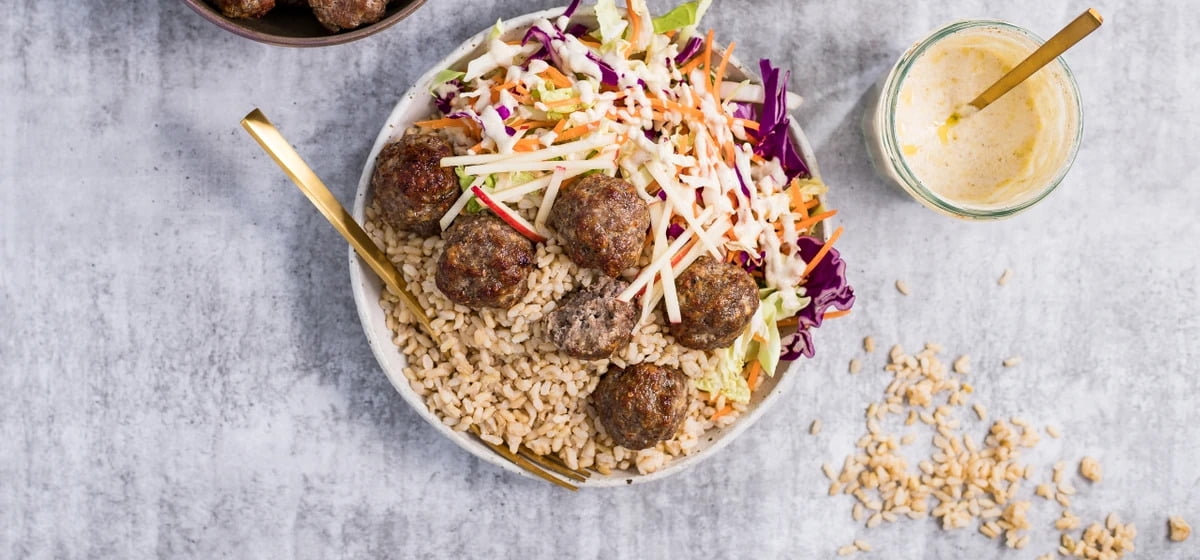 Pork meatball rice bowl with rainbow yogurt slaw