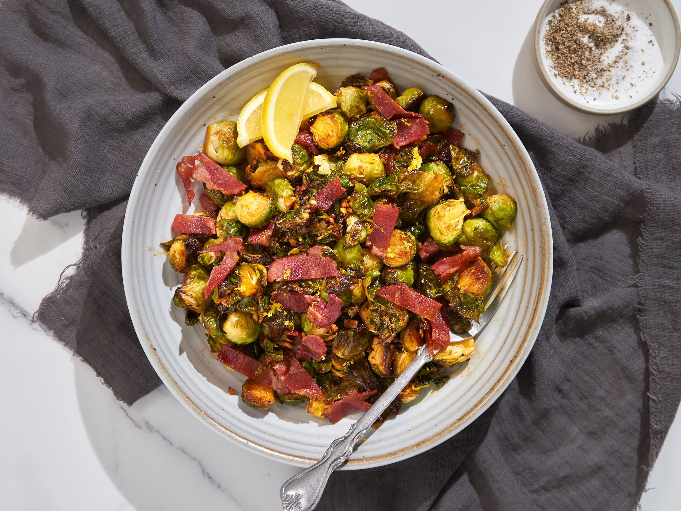 Brown butter brussels sprouts with bacon bits