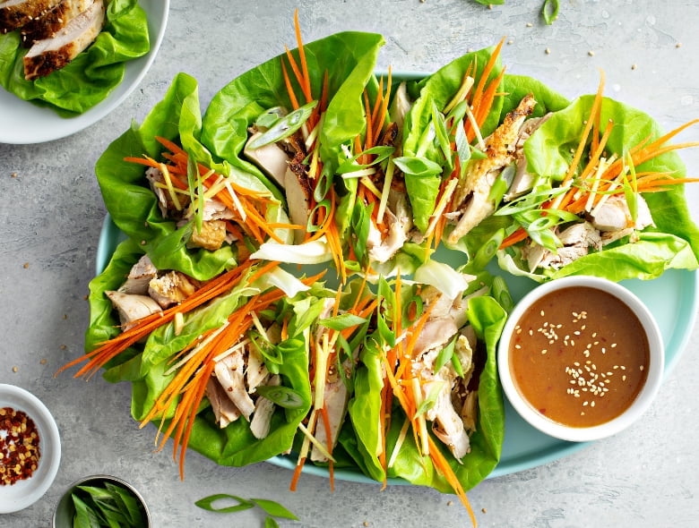 Chicken and cucumber lettuce wraps with peanut sauce