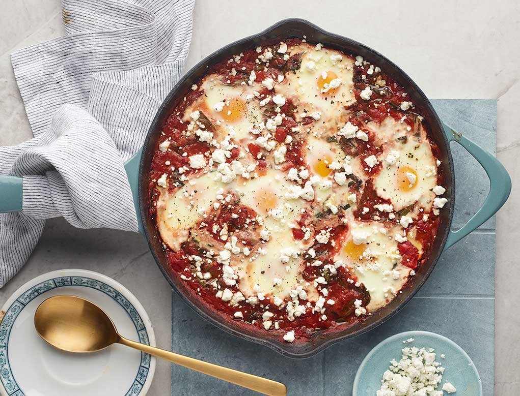 Shakshuka with red peppers and goat cheese