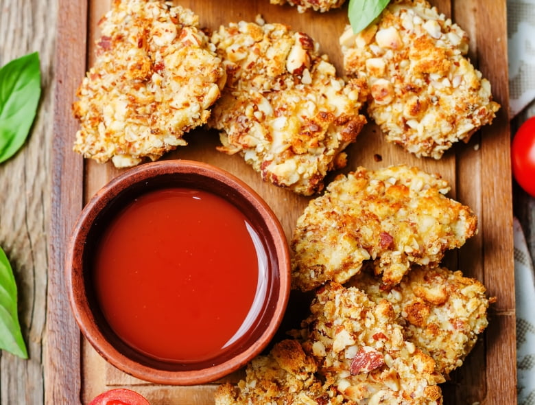 Coconut almond chicken tenders with sweet spicy sauce