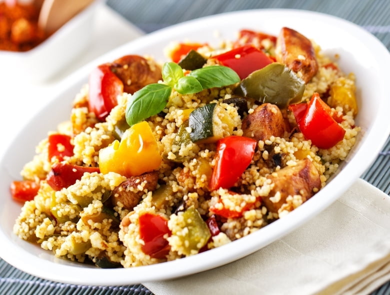 Fresh tomato, peppers, herb, and israeli couscous salad