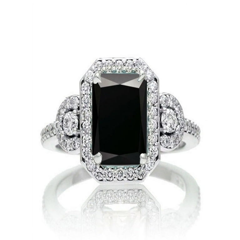 10K White Gold 1/5 CTW Diamond Three Stone Ring 10K White Gold 1/5 CTW Diamond Three Stone Ring