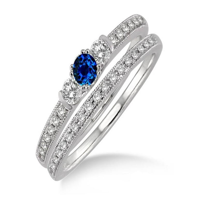 10K White Gold 1/5 CTW Diamond Three Stone Ring 10K White Gold 1/5 CTW Diamond Three Stone Ring