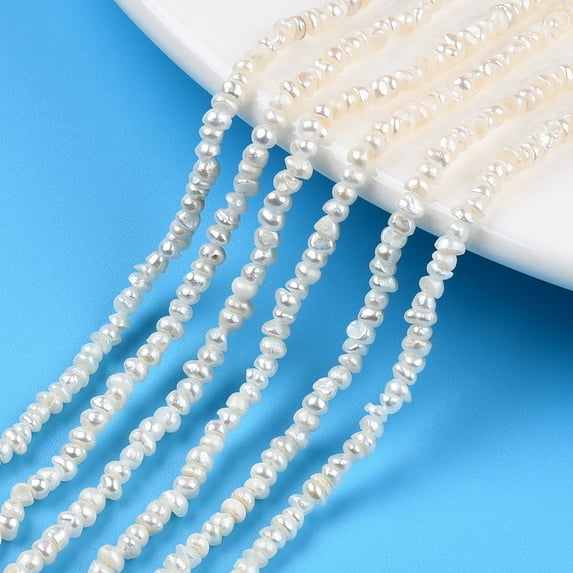 1 Strand Natural Cultured Freshwater Pearl Beads Strands Flat Round Seashell Color 2.5~3.5x1.5~2mm Hole: 0.5mm 185~239pcs/strand 13.50 inch~13.86 inch(34.3~35.2cm)