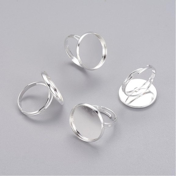 10 pc Adjustable Brass Pad Ring Bases Silver color Plated Size: Ring: 17mm inner diameter Tray: 20mm in diameter inner round: 18mm long 18mm wide.