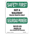 thumbnail image 1 of 10 x 14 in. OSHA Safety First Sign - Not A Walkway Truck Traffic Bilingual, 1 of 1