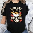 thumbnail image 1 of 100% Cotton Bad Day To Be A Deviled Egg Funny Halloween Shirt Women Fall Autumn Leaves Cute Egg Design T-Shirt, 1 of 5