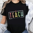 thumbnail image 1 of 100% Cotton Teach Them To Be Kind Teacher Shirt Colorful Typography Graphic T-Shirt for Women and Men Educational Gift Wear, 1 of 5