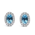 thumbnail image 1 of 10K White Gold 5x3 MM Oval Blue Topaz and Diamond Halo Stud Earrings (I-J Color, I1-I2 Clarity), 1 of 6