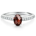 thumbnail image 1 of Gem Stone King 10K White Gold Red Garnet and White Lab Grown Diamond Soitaire Engagement Ring for Women (1.18 Cttw, Oval Checkerboard 7X5MM, Gemstone January Birthstone, Size 9), 1 of 4