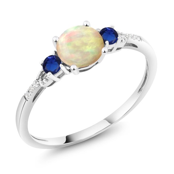 10K White Gold White Ethiopian Opal Blue Created Sapphire and White Diamond Accent 3-Stone Engagement Ring for Women (0.70 Cttw, Round Cabochon 6MM, Gemstone October Birthstone, Size 8.5)