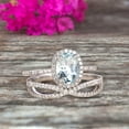 thumbnail image 1 of 10k White Gold 1.75 Carat Oval Cut Aquamarine Engagement Rings With Twisted Wedding Band Diamonds Halo Design, 1 of 5