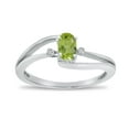 thumbnail image 1 of 10k White Gold Oval Peridot And Diamond Wave Ring, 1 of 6