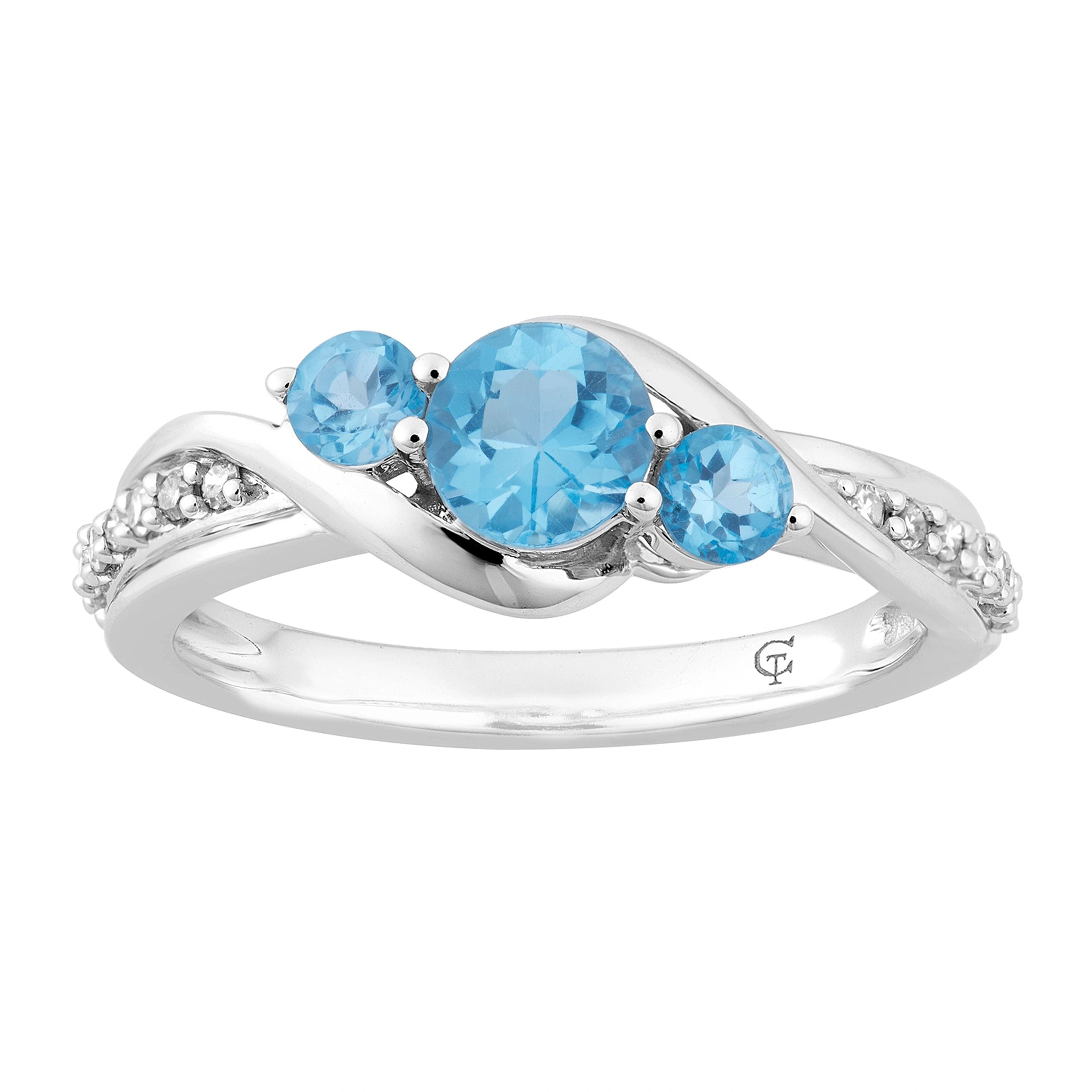 10k White Gold Swiss Blue Topaz & 1/10 Carat T.W. Diamond 3-Stone Ring