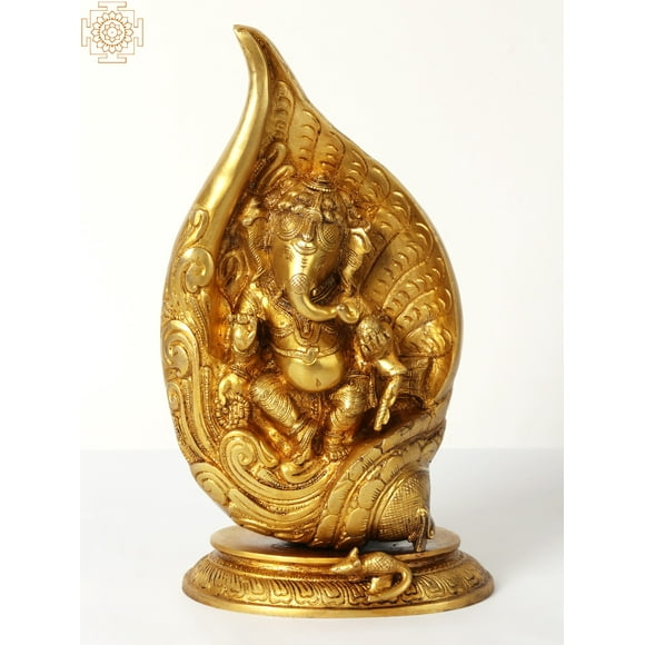 12" Lord Ganesha In The Folds Of A Conch In Brass | Handmade | Made In India - Brass Sculpture - Color Natural Brass
