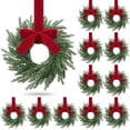 thumbnail image 1 of 12 Pcs Small Christmas Norfolk Wreaths Evergreen 12.6 Inch Christmas Kitchen Cabinet Mini Wreaths Real Touch with Bow and Burgundy Ribbon for Xmas Front Door Window Home Table Pillar Decor, 1 of 8