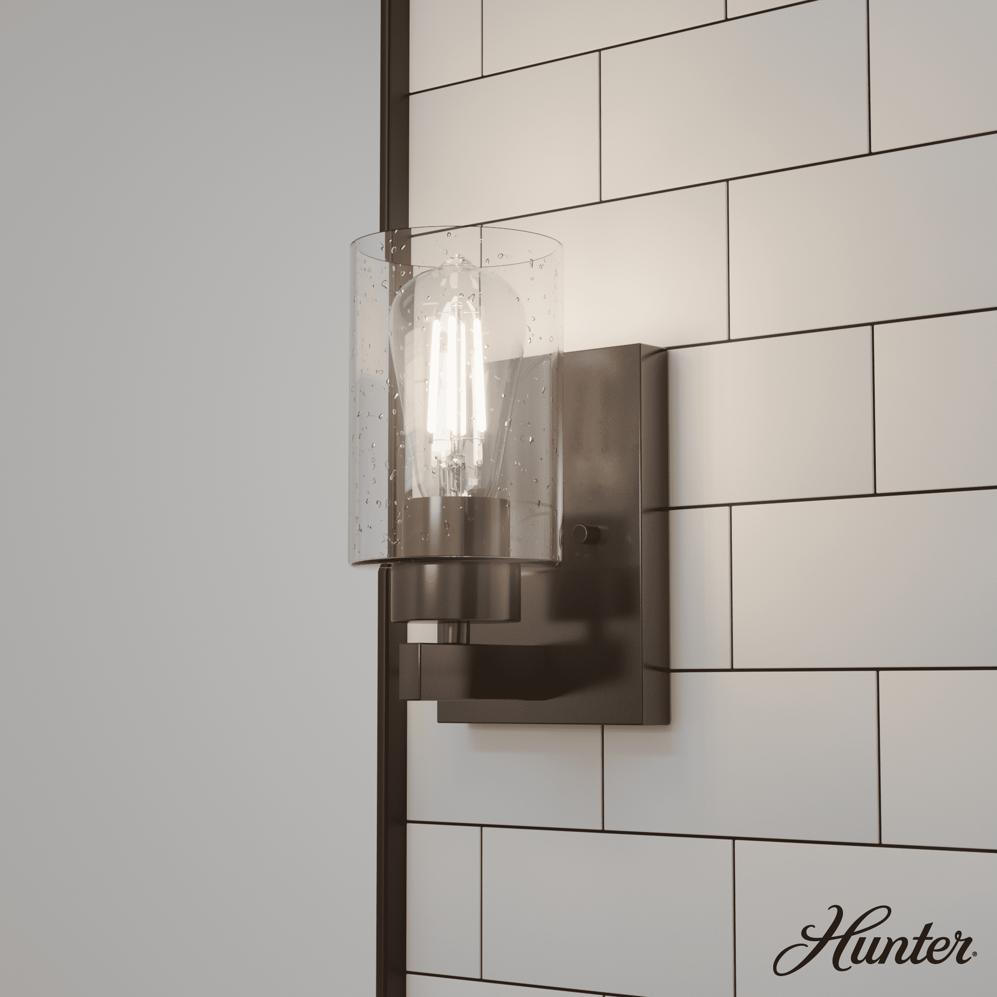 Noble Bronze Dimmable Metal Wall Sconce with Seeded Glass Shade