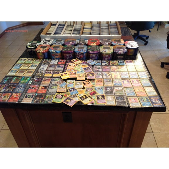 150 Assorted Pokemon Cards with Collectible Tin in Multicolor