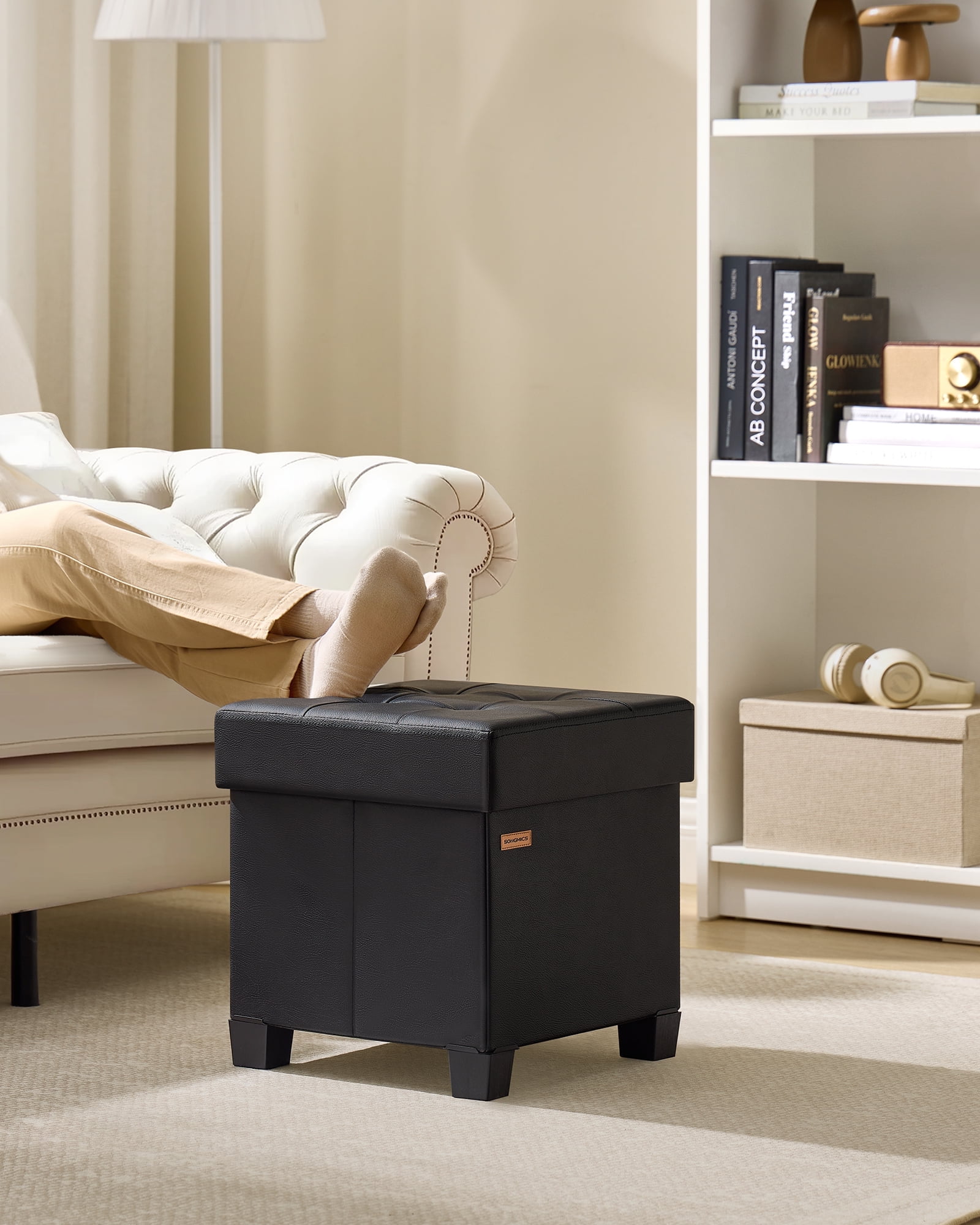 SONGMICS 15x15x15.7-Inch Cube Storage Ottoman with Legs. 10 Gal (37 L) Capacity. Synthetic Leather Footstool/Footrest.Ink Black