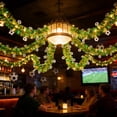 thumbnail image 1 of 16.4ft LED Soccer Tinsel Garland - Battery Operated Green Foil String Lights with Football Accents - 2026 Stadium Decorations & Fan Cave Decor, 1 of 9
