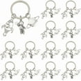 thumbnail image 1 of 16Pcs Planet Astronaut Keychain Alloy Spaceman Rocket Charms Pendants Keyring Space Theme Accessories with Keyring Astronaut Space Party Favors for Backpack Bag Purse Gifts Silver, 1 of 6