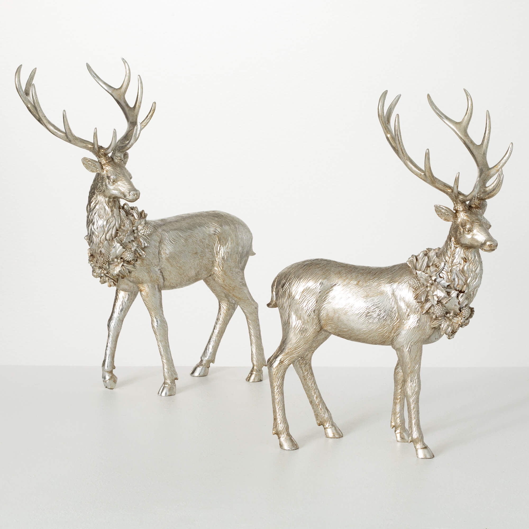 Regal Silver Deer Figurine Set with Intricate Detailing