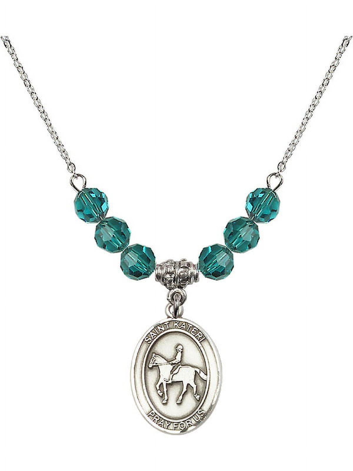 18-Inch Rhodium Plated Necklace with 6mm Blue December Birth Month Stone Beads and Saint Kateri/Equestrian Charm