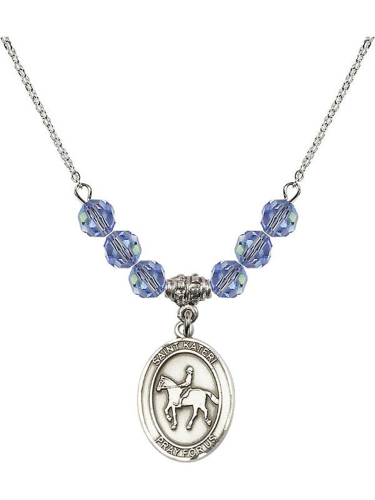 18-Inch Rhodium Plated Necklace with 6mm Light Blue September Birth Month Stone Beads and Saint Kateri/Equestrian Charm