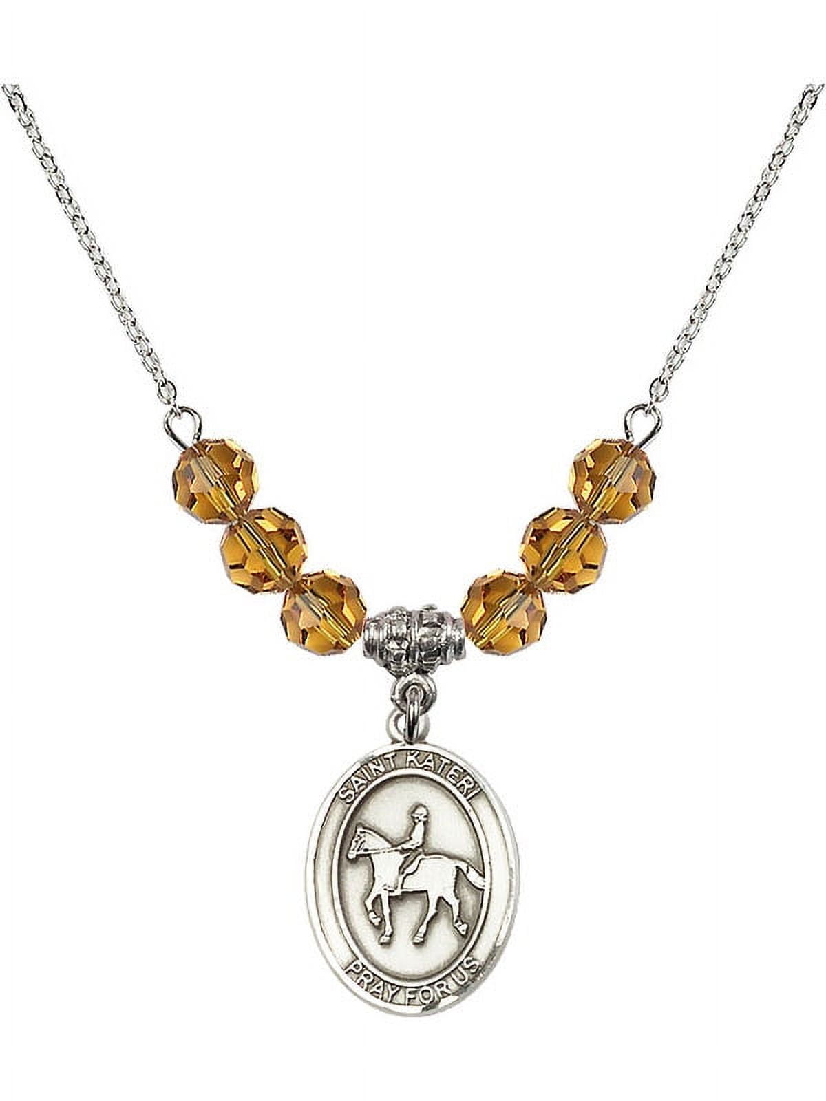 18-Inch Rhodium Plated Necklace with 6mm Yellow November Birth Month Stone Beads and Saint Kateri/Equestrian Charm