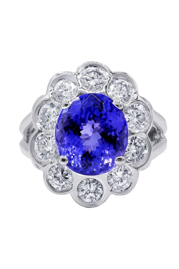 18 Kt White Gold Flower Design Ring Featuring A Center 6.58 Ct Round Tanzanite Surrounded By 2.00 Cts Tw Of Round Diamonds C. Dunaigre