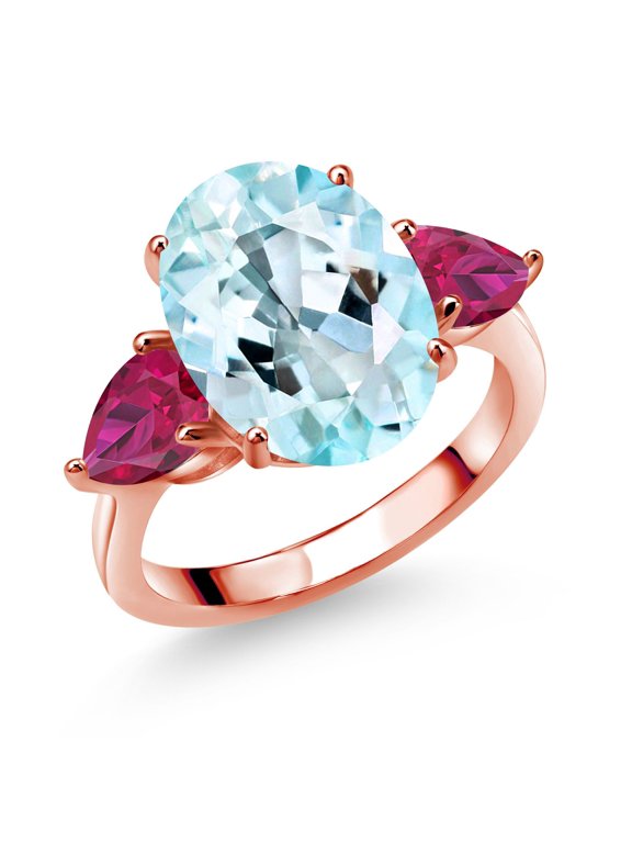 18K Rose Gold Plated Silver Sky Blue Topaz and Red Created Ruby Ring for Women (8.18 Cttw, 14X10MM Oval and 7X5MM Pear Shape, Gemstone November Birthstone, Size 7)