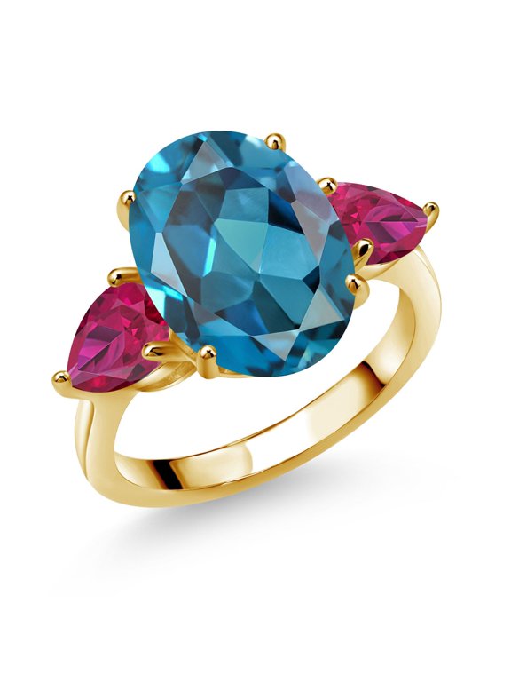 18K Yellow Gold Plated Silver London Blue Topaz and Red Created Ruby Ring for Women (8.50 Cttw, 14X10MM Oval and 7X5MM Pear Shape, Gemstone November Birthstone, Size 6)