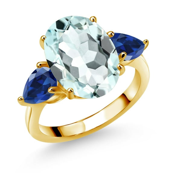 Gem Stone King 18K Yellow Gold Plated Silver Sky Blue Simulated Aquamarine and Blue Created Sapphire Ring for Women (7.70 Cttw, 14X10MM Oval and 7X5MM Pear Shape, Gemstone, Size 5)