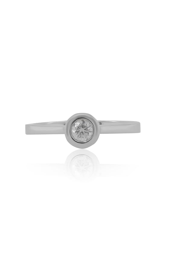 18Kt White Gold Bezel Set Diamond Ring Containing 0.25 Cts Tw (Gh Vs Si)