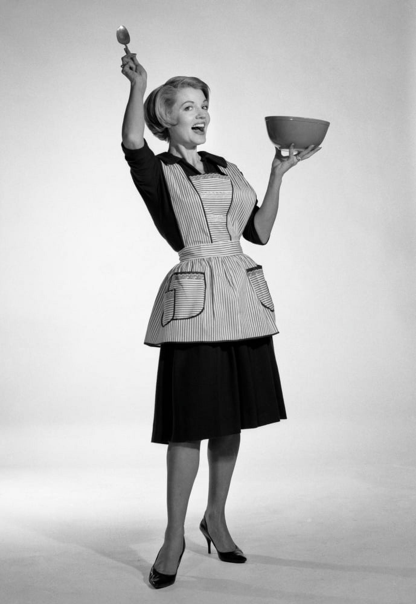 https://i5.walmartimages.com/seo/1960s-Excited-Woman-Housewife-In-Apron-Black-Dress-And-High-Heels-Looking-At-Camera-Holding-Up-Mixing-Bowl-And-Kitchen_f1822f2b-6cf3-4fc5-aa04-3de0db011524.347fe657dfd5da6a72ad7e53593bd101.jpeg