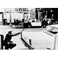 thumbnail image 1 of 1965 Watts Riots. A Policeman Aims His Revolver At Building Where A Sniper Shot At Passing Cars. Across The Street History (36 x 24), 1 of 1