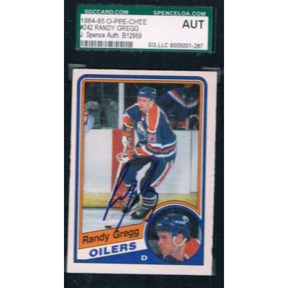 1984-85 O-Pee-Chee #242 Randy Gregg Oilers JSA Auto Hockey Card Near Mint or Better
