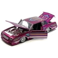 thumbnail image 1 of 1986 Chevrolet Monte Carlo SS Lowrider Pink Metallic with Graphics "Lowriders" Series 1/24 Diecast Model Car by Maisto, 1 of 1