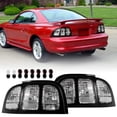 thumbnail image 1 of 1996-1998 Ford Mustang Black Trim All Clear Lens Tail Lights - Unique Style Racing, 1 of 11
