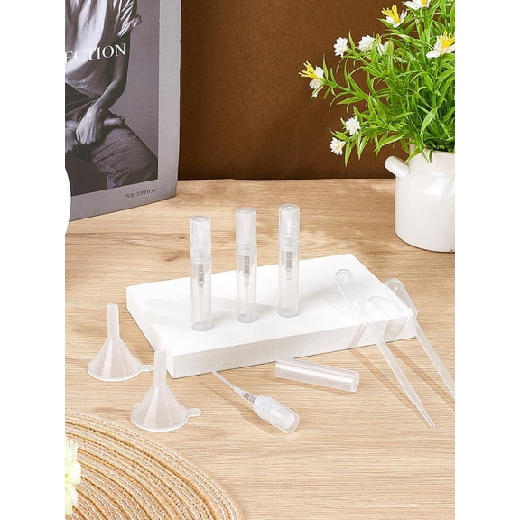 1Set 4Pcs Plastic Spray Bottles Refillable Perfume Bottles with Fine Mist Sprayer Dust Caps Portable Mini Perfume 1.2x6.55cm Capacity: 3ml(0.10fl. oz) Clear