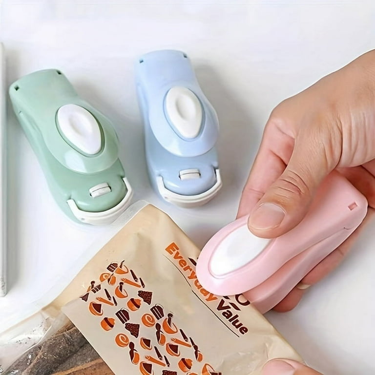 https://i5.walmartimages.com/seo/1pc-Mini-Household-Portable-Sealing-Machine-Hand-Pressure-Heat-Sealing-Machine-Food-Snacks-Plastic-Bag-Sealing-Machine-Battery-Not-Included_2c254253-01ff-4197-a904-8c0b1610caf1.047be9429f1c3c7887a65b11cec48316.jpeg?odnHeight=768&odnWidth=768&odnBg=FFFFFF