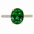 thumbnail image 1 of 2.21 ct Oval Cut Simulated Emerald Solitaire with Simulated Diamond Accents 18K Yellow Gold Womens Engagement Ring, 1 of 3