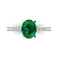 thumbnail image 1 of 2.21 ct Oval Cut Simulated Emerald Solitaire with Simulated Diamond Accents 18K White Gold Womens Engagement Ring, 1 of 5