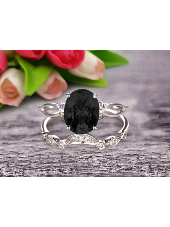 2.25 Carat Oval Cut Black Diamond Moissanite Bridal Ring Set With Curved Loop Stacking Matching Wedding Band On 10k White Gold