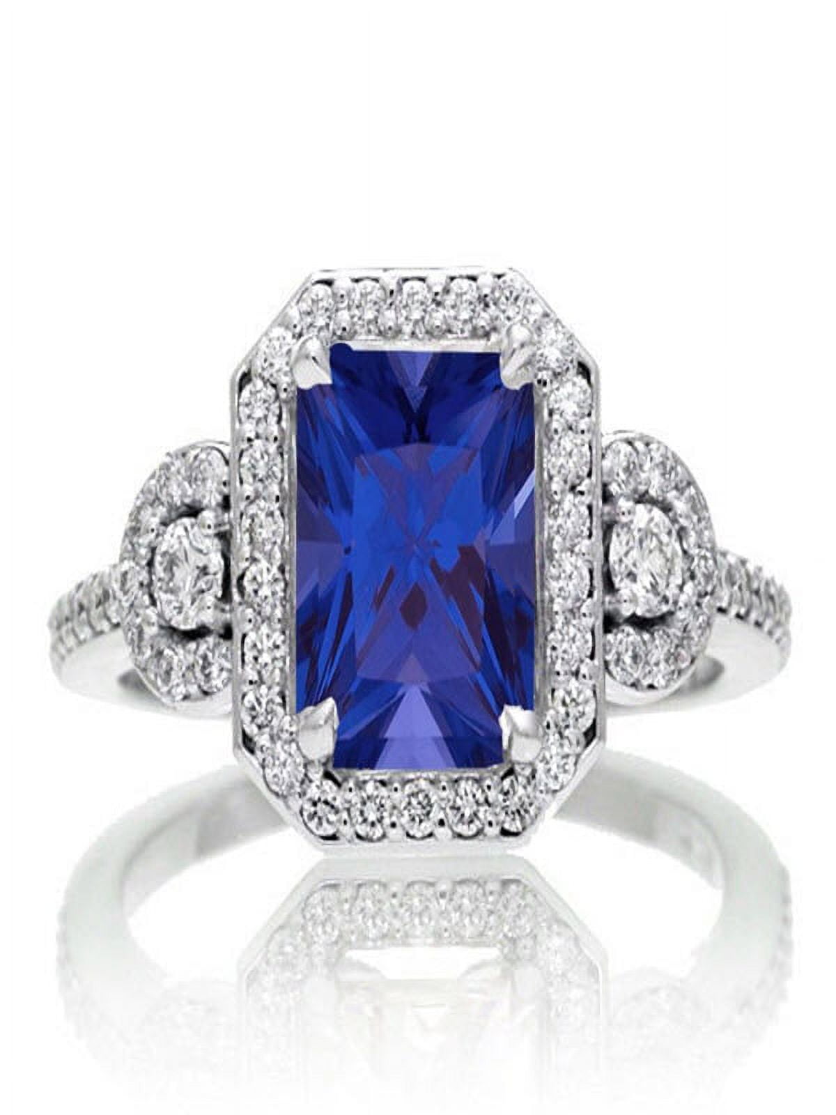 2 Carat Emerald Cut Sapphire and White Diamond Halo Engagement