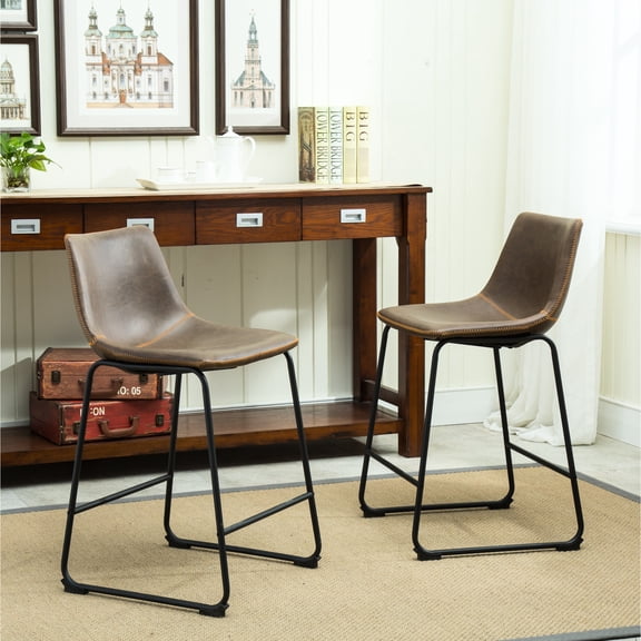 2 Of Vintage Pu Leather Counter Height Stools, Antique Brown Hue. Strong Plastic Molded Seats With Upholstery. Black Iron Frame Dining Chairs. Measurements: 18.5"w X 21.5"d 34.5"h. Seat: 15"d 24.5"h