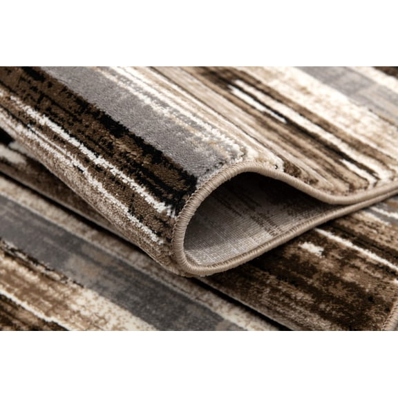 2' X 3' Brown Ivory and Tan Abstract Washable Non Skid Area Rug